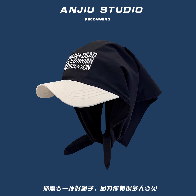 Nero [cappello a turbante con ricamo a lettera]]