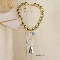 Collier populaire avec pendentif oiseau tridimensionnel perlé et tissé, et chaîne de cou luxueuse
