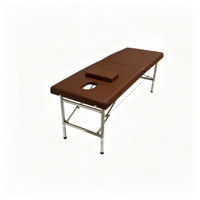 Table de massage pliable robuste à 2 sections avec pieds en acier inoxydable, éponge haute densité, design moderne pour la salle de sport et l'hôtellerie