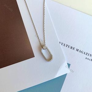 Collier Dylam avec anneau martelé, pendentif anneau en argent, grand anneau, connecteur ovale, connecteurs dorés, cadeau pour couple - Product Image 5