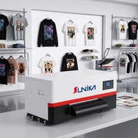 Imprimante DTF à double tête A3 haute vitesse avec circulation stable d'encre blanche pour T-shirts et petites ateliers de confection – Approvisionnement direct usine