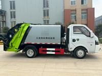 Camion à ordures compacteur Dongfeng 5CBM Diesel 4x2 à transmission manuelle avec moteur et boîte de vitesses, norme d'émission Euro 3