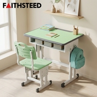 Bureau d'école pour enfants avec chaise, vert clair, bordure blanche, rangement ouvert et hauteur réglable pour une utilisation en classe