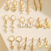 Nouvel ensemble de 9 boucles d'oreilles minimalistes de style européen en alliage plaqué or, avec étoile à cinq branches, papillon et cœur, et chaîne serpent