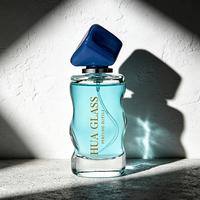 Flacon de parfum en verre le plus populaire, 50 ml, forme abstraite, flacon de parfum personnalisé, estampage à chaud en feuille d'or avec couvercle et boîte cadeau