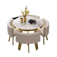 Ensemble de table à manger ronde moderne avec pieds en métal et plateau en résine, design stable pour salles à manger et salons