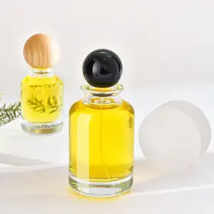 Custom Wholesale 50 Ml 30 Ml 100 Ml Perfume Bottle Empty With Wooden Lid Round Clear Perfume Glass Bottles