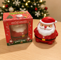 Jouet Squishy Père Noël multicolore festif et très populaire, emballé individuellement dans une boîte cadeau, idéal pour les cadeaux de Noël