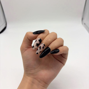 <span class=keywords><strong>Uñas</strong></span> Postizas <span class=keywords><strong>de</strong></span> ABS, Color Negro Almendrado y Estampado <span class=keywords><strong>de</strong></span> Vaca, <span class=keywords><strong>Uñas</strong></span> a Presión Reutilizables, Arte <span class=keywords><strong>de</strong></span> <span class=keywords><strong>Uñas</strong></span>, 24 Piezas al por Mayor - Product Image 2