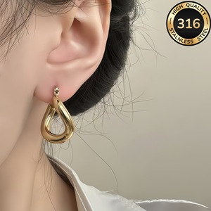 Vente en gros de boucles d'oreilles géométriques creuses de style InS, boucles d'oreilles en acier inoxydable 316L à faible sensibilité, simples et luxueuses - Product Image 1