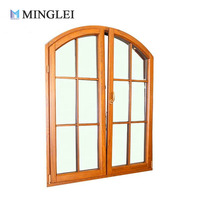 Ventanas Oscilobatientes de Aluminio y Madera de Nogal Macizo con Triple Acristalamiento con Recubrimiento Low-E y Relleno de Gas Argón