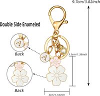 Porte-clés en métal pour femme, motif fleur et initiale, breloque pour sac à main, vente en gros d'usine, best-seller