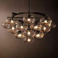 Lustres ronds en verre transparent Cabrette, luxe pour salon, personnalisation sur mesure, fabrication directe, art du verre