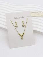 Ensemble de bijoux plaqué or 18 carats en cuivre avec pendentif dentaire et boucles d'oreilles, vente en gros