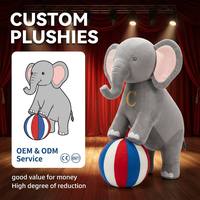 Peluche d'éléphant personnalisée OEM de 30 cm, équilibrée sur une balle, pour la décoration d'événements d'anniversaire