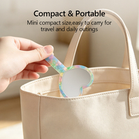 Miroir de poche compact personnalisé en acétate en forme de cœur avec logo, idéal pour les boutiques, la vente au détail et les coffrets cadeaux