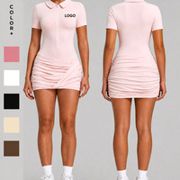 Mini-jupe froncée à col polo et demi-zip, personnalisable avec logo OEM, pour femme, anti-exposition, sensation seconde peau, séchage rapide, effet push-up, pour la course, le Pilates et la gym