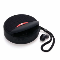 Enceinte Bluetooth portable 2-en-1 avec basses puissantes pour l'extérieur, lecteur MP3/MP4 longue autonomie et écouteurs sans fil TWS