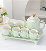 Service à thé en céramique à rayures verticales européennes avec plateau en métal doré, ensemble de vaisselle haut de gamme, cadeau de nouvelle maison, ensemble de tasses à café
