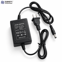 Adaptor Daya AC/DC 24W OEM/ODM 100-240Vac 5V/9V/12V/24Vdc Kelas II Level VI untuk KVM Switch & CCTV Hynapower HP-A24S-1