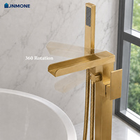 Robinet de baignoire de luxe en laiton, sur pied, avec mitigeur chaud/froid et douchette à main
