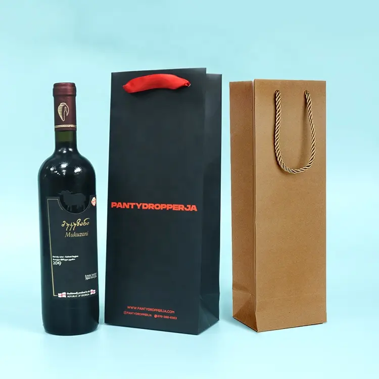 Vente en gros de sac à vin unique kraft recyclable avec logo personnalisé sac cadeau d'emballage de vin écologique avec poignée en papier d'art imprimé