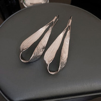 Boucles d'oreilles pendantes en métal en forme de feuille, style exagéré et tendance, pour accessoires féminins