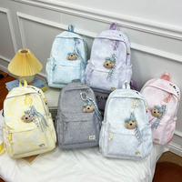 Sac à dos de voyage léger et polyvalent pour femmes et hommes, sac d'école confortable pour les trajets quotidiens avec pendentif ours en peluche