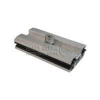 Kit de fixation intermédiaire pour module à double vitrage à film mince, adapté aux panneaux solaires sans cadre