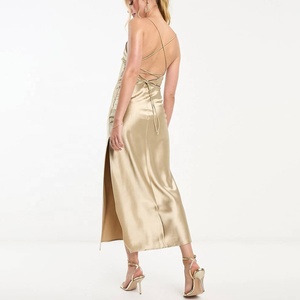 guy in red dress at golden globes VENUS Faux Leather Mini Dress | Gold Metallic main image 0