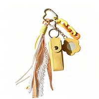 Nouvelle Trousse de Rangement Portable Personnalisée 2026 Tendance, Mignonne et de Haute Qualité, en Cuir PU pour Rouge à Lèvres et Brillant à Lèvres, avec Porte-clés Breloque