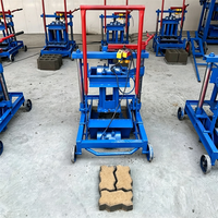 Petite machine électrique de fabrication de briques de ciment emboîtables