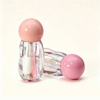 Tube de gloss transparent à effet d'ondulation irrégulière, avec bouchon sphérique, emballage vide pour gloss