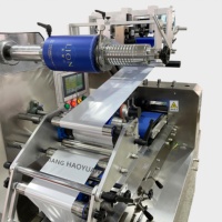 Ligne de production entièrement automatique de tissus humides pour bébé Machine de fabrication de lingettes humides