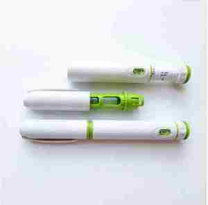 Stylo jetable 10mg avec petite fenêtre, design vert et blanc - Product Image 1