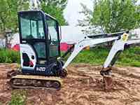 Mini-excavatrice CAT E20 d'occasion en bon état, 2 tonnes, excavatrice hydraulique sur chenilles avec accessoire tarière, chenilles en caoutchouc