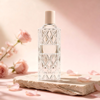 Flacon pulvérisateur de parfum en verre transparent en gros, 100 ml, forme cylindrique, distributeur cosmétique vide