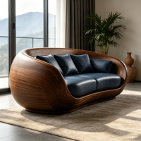 Canapé trois places en cuir bleu foncé, structure en fibre de verre, placage bois, coque enveloppante arrondie, design artistique de luxe pour salon