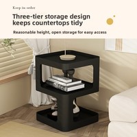 Table basse minimaliste moderne en fer avec plateau en verre et étagère de rangement pour chambre et salon