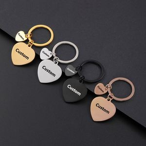 Offre spéciale : porte-clés en acier inoxydable personnalisé en forme de cœur avec petit élément en forme de cœur - Product Image 1