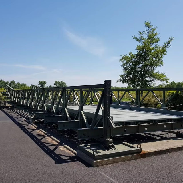 Standardized Component Bridges for Rapid Construction of Crossings Over Rivers and Obstacles