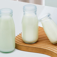 Bouteilles en verre pour lait frais, yaourt, pudding spécialisé, bouteilles de boissons lactées pour les bars à lait, bocaux scellés résistants aux hautes températures