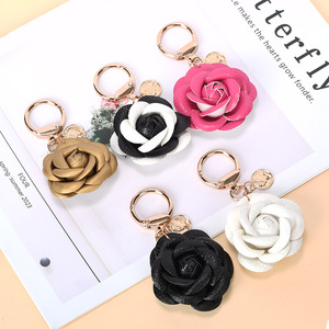New Fashion Camellia Flower Shape Bag Charm Tassel Keychain for Woman Luxury Jewelry Bag Decoration Pendant Accessories - Product Image 1