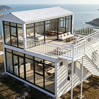 Conteneur plat de 20 pieds, maison préfabriquée modulaire à deux étages, bureau, hôtel, villa moderne avec grandes fenêtres en verre