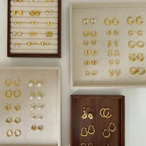 New Simple Design 18K Gold Metal Texture Irregular Fashionable Light Luxury Hoop Earrings For Women Jewelry