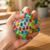 Jouet sensoriel anti-stress en forme de boule de raisin en plastique coloré, rempli de poudre dorée, pour enfants