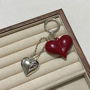 Porte-clés en plastique rouge pour le Nouvel An - Pendentif cœur pêche tendance pour sac, téléphone, clés, décoration de cadeaux - Product Image 3