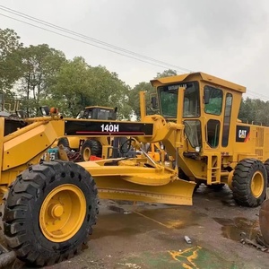 Niveleuse sur pneus Caterpillar 140 H/G/K d'occasion Origine Japon/USA Moteur et pompe Construction Machine de terrassement Vente - Product Image 1