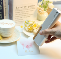 Imprimante jet d'encre DTF portable automatique avec tête d'impression XP600 pour l'impression d'étiquettes de café, de tubes de tatouage et de factures avec encre comestible