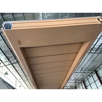 Fabricant de portes de garage à lattes de style australien sur mesure, portes sectionnelles automatiques et portes à rouleaux résidentielles pour villa